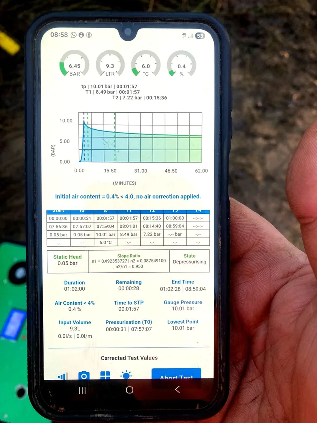 SmartSite testing report displayed on a mobile phone